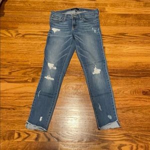 Flying Monkey light wash distressed jeans.